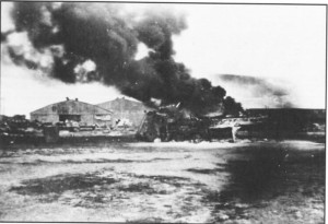 Clark Field burns in the aftermath of the Japanese air raid of 8 December 1941. (Courtesy The Bataan Commemorative Research Project Scrapbook)